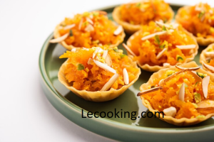 carrot gajar halwa canape canapa a fusion tart garnished with dry fruits indian dessert 466689 69196