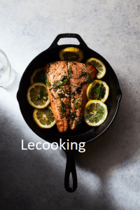 grilled salmon with lemons black pot white surface 181624 6206